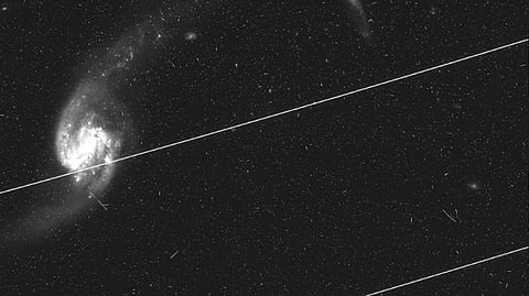 Astronomers fret as private satellites photobomb Hubble Telescope