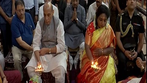 Union Defence Minister Rajnath Singh offering prayers at temple