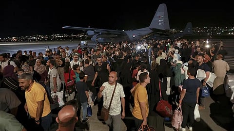 Jordanians evacuated from Sudan arrive at a military airport