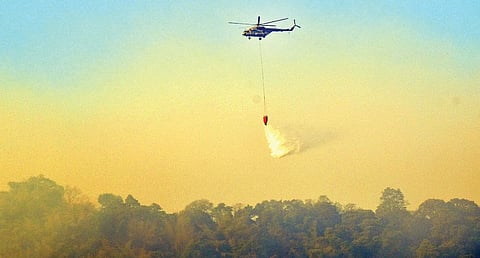 IAF chopper deployed in firefighting operations in Madukkarai range on April 16