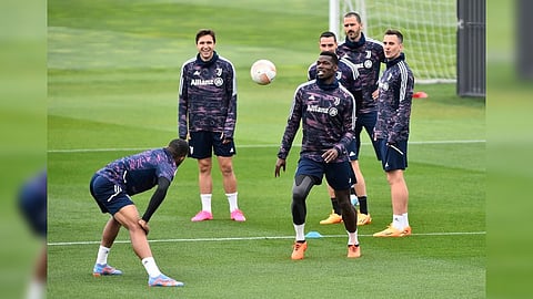Juventus' Paul Pogba with teammates during training