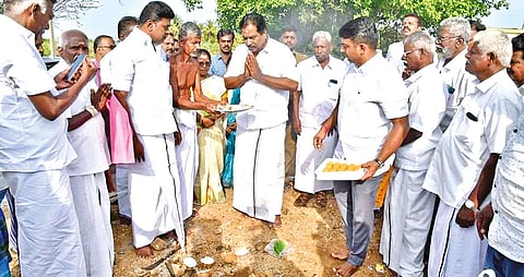 Minister P Moorthy performing bhoomi puja for a 3.57 km road at Gandhinagar in Mangulam village, Madurai on Tuesday
