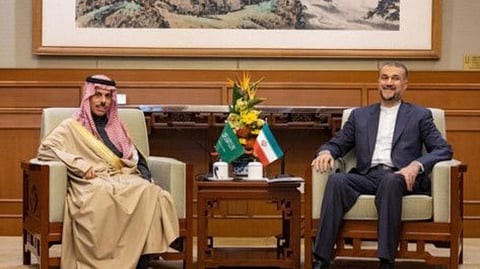 Saudi Foreign Affairs Minister Prince Faisal bin Farhan (left) and Iran's Foreign Minister Hossein Amir-Abdollahian met in Beijing on April 6