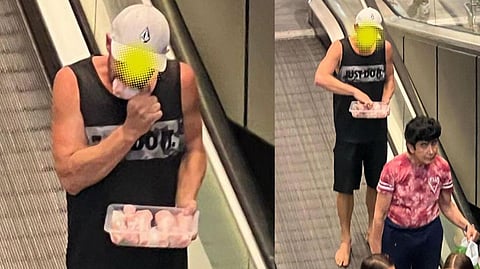 Pictures of man eating raw chicken