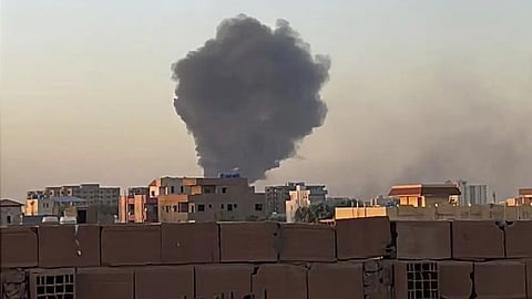 Smoke fills the sky in Khartoum, Sudan, near Doha International Hospital