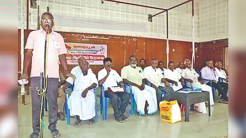 AITUC state secretary Chandra Kumar addressing union members in Thanjavur on Saturday