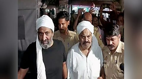 Atiq Ahmad and brother Ashraf Ahmad.