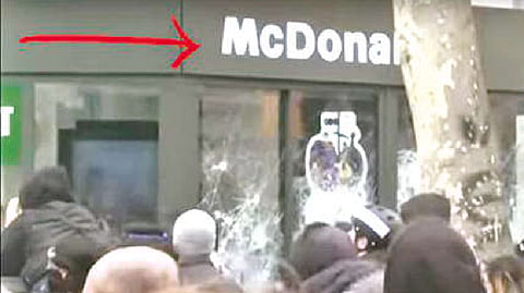 Protesters smash shopfronts in Central Paris over pension reforms