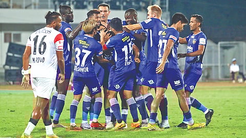 Chennaiyin FC players celebrate scoring a goal against NorthEast United