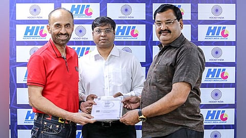 Hockey India president Dilip Tirkey with secretary general Bhola Nath Singh at HIL re-launch press conference