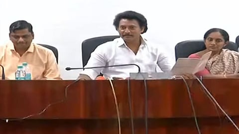 School education minister addressing the press