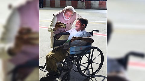 Prime Minister Narendra Modi taking selfie with specially-abled BJP worker in Chennai on Saturday