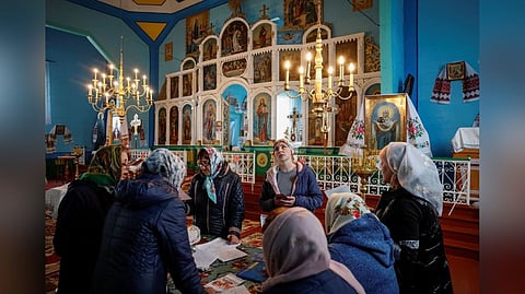 Members of the church choir, which switched from the Ukrainian Orthodox Church (UOC) to the Orthodox Church of Ukraine (OCU) rehearsing.