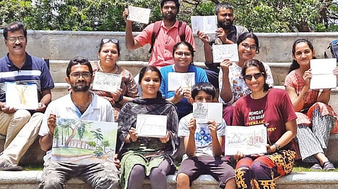 Participants with their artworks