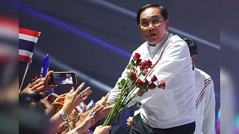 Thailand's incumbent Prime Minister Prayuth Chan-ocha greets supporters at the United Thai Nation Party's (Ruam Thai Sang Chart Party) rally event ahead of the upcoming general election, in Bangkok