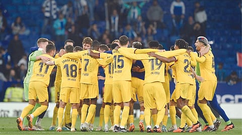 Barcelona ends four-year drought, clinches La Liga title in style