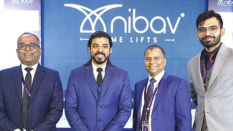 Vimal R Babu flanked by company?s senior officials