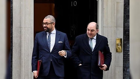British Foreign Secretary James Cleverly and Defence Secretary Ben Wallace walk outside Downing Street as they attend the British cabinet's weekly meeting, in London