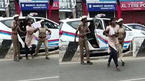 Screengrab from the video where two Avadi police personnel help NEET aspirant reach the exam centre in time