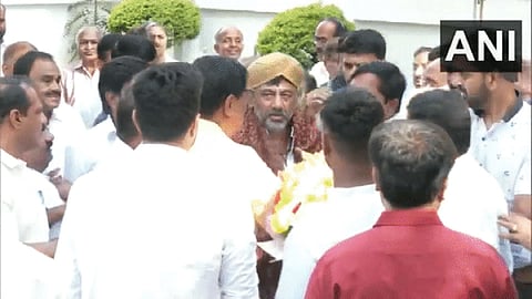 KPCC chief DK Shivakumar meeting his supporters gathered outside his residence