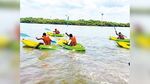 Tourists enjoying a ride in kayaks near Karankadu shore in Ramanathapuram