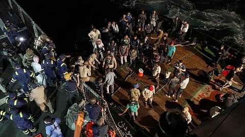 Saudi Royal Navy help civilians board their ship in Port Sudan