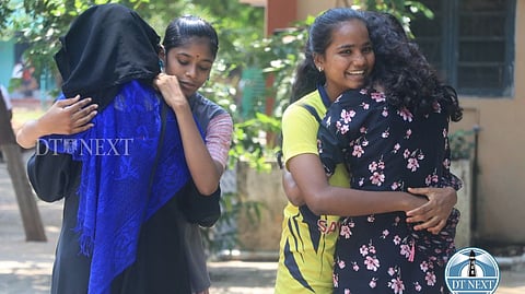 Students greeting each other