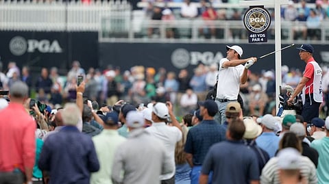 Rochester, New York, USA; Scottie Scheffler hits a tee shot on the seventh hole during the second round of the PGA Championship golf tournament.