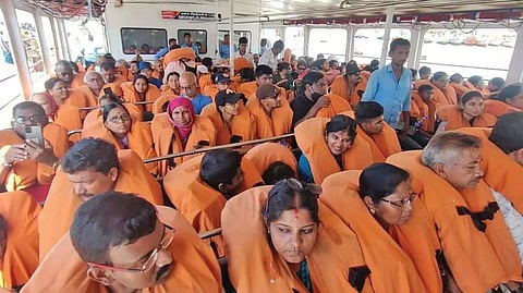 Passengers wearing life jacket in the tourist boat