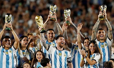Argentina's Lionel Messi and teammates