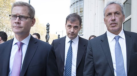Businessman Alejandro Burzaco (C) of Argentina leaves the Federal Court in Brooklyn, New York
