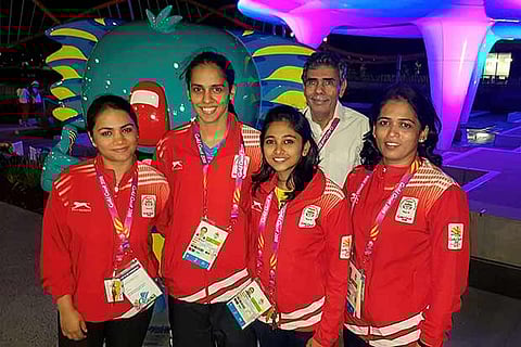 Saina Nehwal (second from left) and her father with other Indian athletes