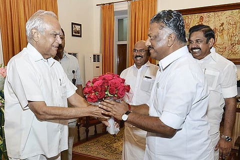 The Governor greets EPS and OPS at Raj Bhavan