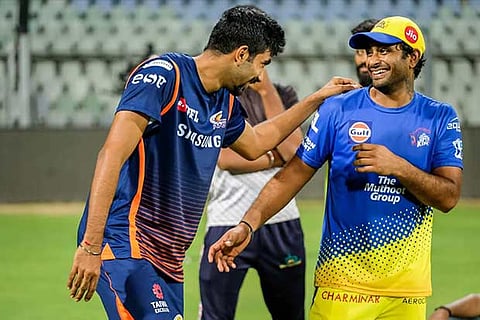 MI?s Jasprit Bumrah (left) and Ambati Rayudu of CSK have a chat ahead of the opening match