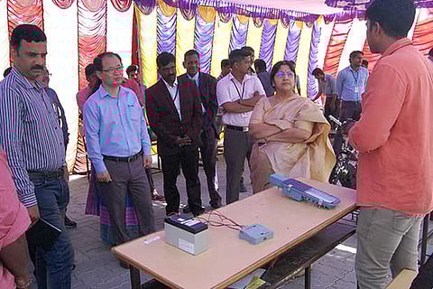 Dignitaries at one of the exhibits at the event