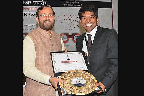 CMC Vice Principal Solomon Satish receiving the NIRF award