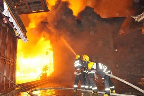 Police in southern China captured a man suspected to have started a blaze in a karaoke TV lounge