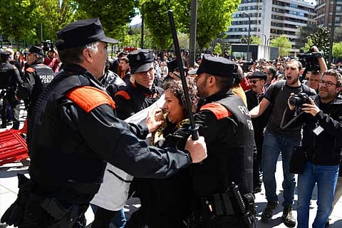 Protester breaks through a police line