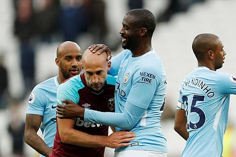 West Ham United's Pablo Zabaleta with Manchester City's Yaya Toure after the match
