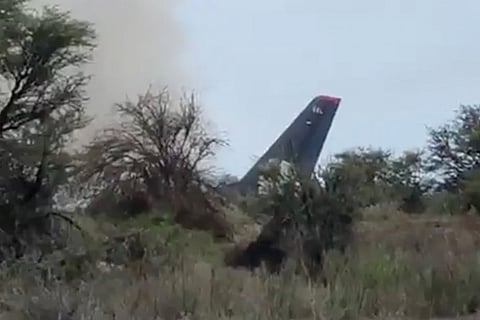 Smoke billows above an Aeromexico-operated Embraer passenger jet that crashed in Mexico