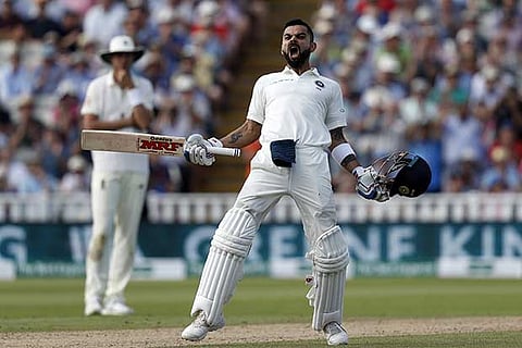 Indian skipper Virat Kohli celebrates his century