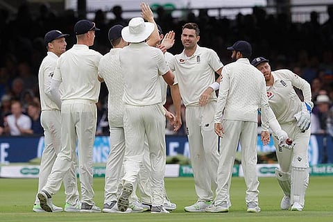 England players celebrate taking the wicket of India's Lokesh Rahul