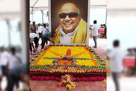 Fruit decoration being made at the site where Karunanidhi was buried