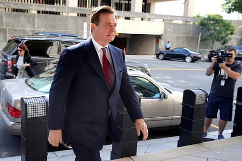 Former Trump campaign manager Paul Manafort arrives for arraignment