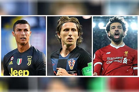 (L to R) Cristiano Ronaldo, Luka Modric and Mohamed Salah