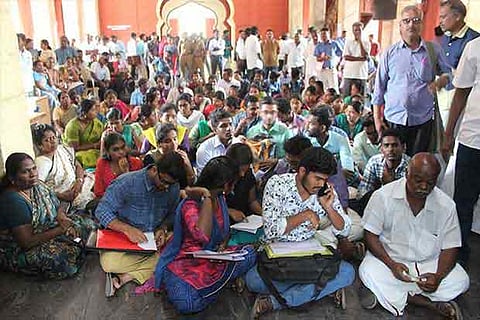 Students, who graduated from Annamalai University, squat on the TNAU campus