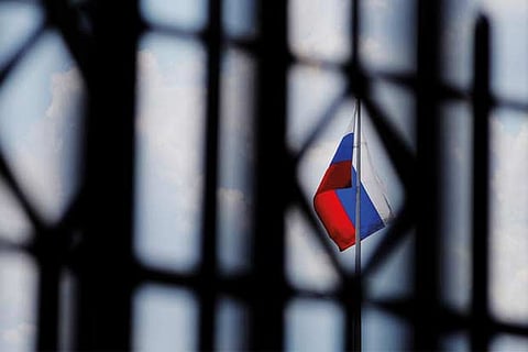 The Russian flag flies over the Embassy of Russia in Washington