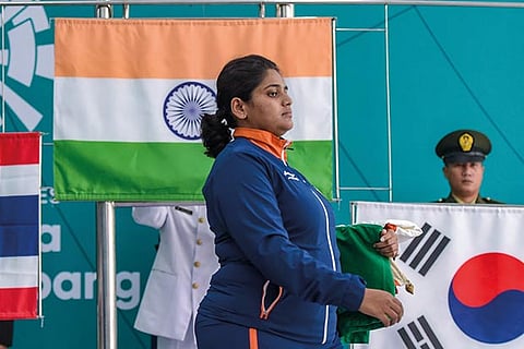 Gold medalist shooter Rahi Sarnobat arrives for the presentation ceremony