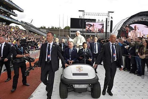 Pope Francis waves as he attends the Festival of Families at Croke Park