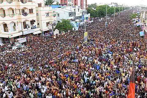 File photo of Sea of devotees on the beach road at Besant Nagar